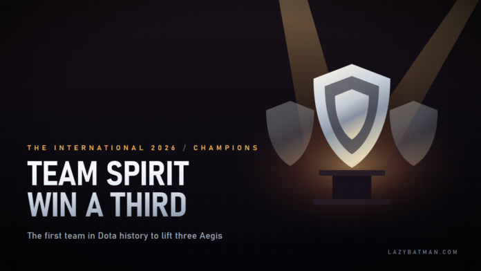 TI 2026 grand final: three Aegis of Champions under stage spotlights, the third lit, marking Team Spirit as the first three-time International winners